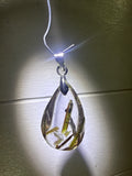 Green Tourmaline in Quartz Pendant