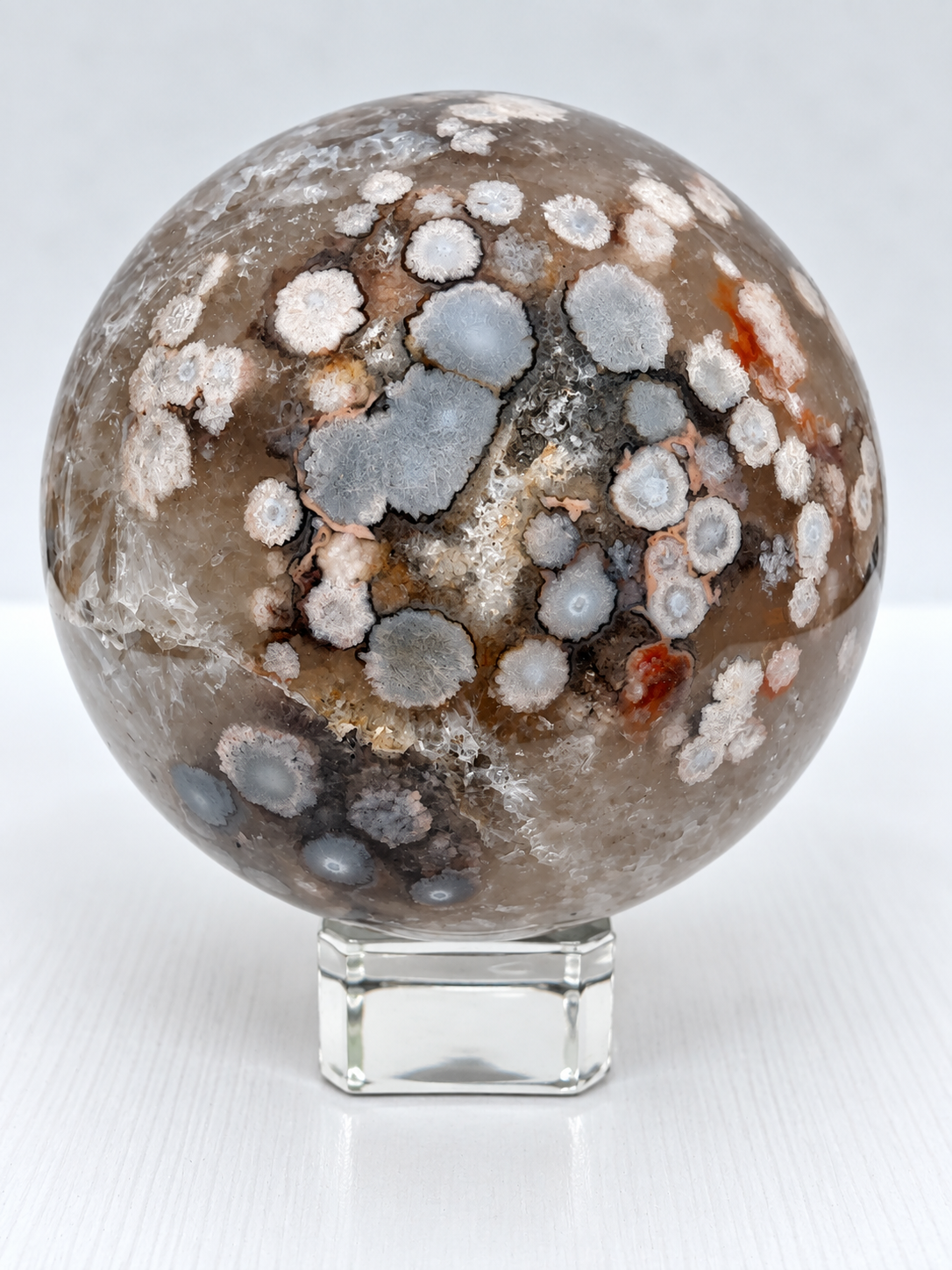 Flower Agate in Smokey Quartz Sphere